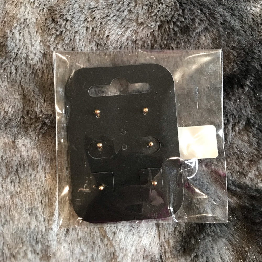 Gold studs free with purchase
